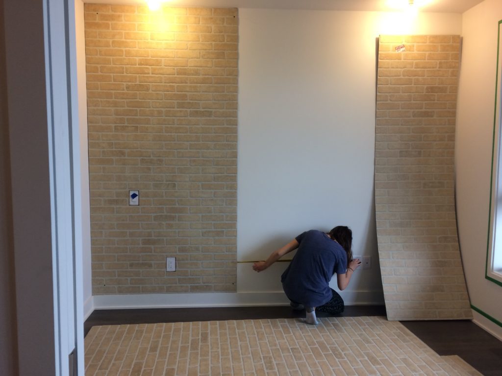 installing faux brick panel